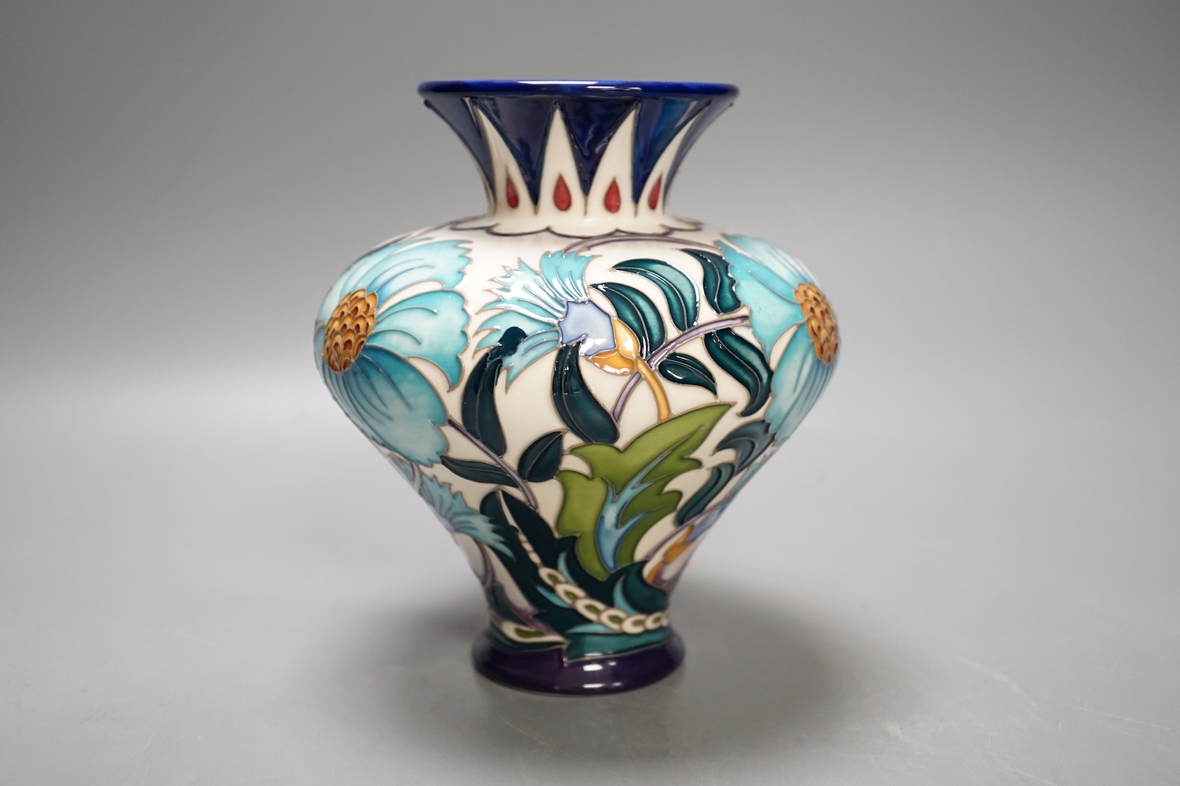 A Moorcroft 'Persian bouquet' trial vase by Emma Bossons, 3.2.21, boxed, 15.5 cms high.